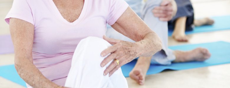 Portrait of a senior woman enjoying a yoga class